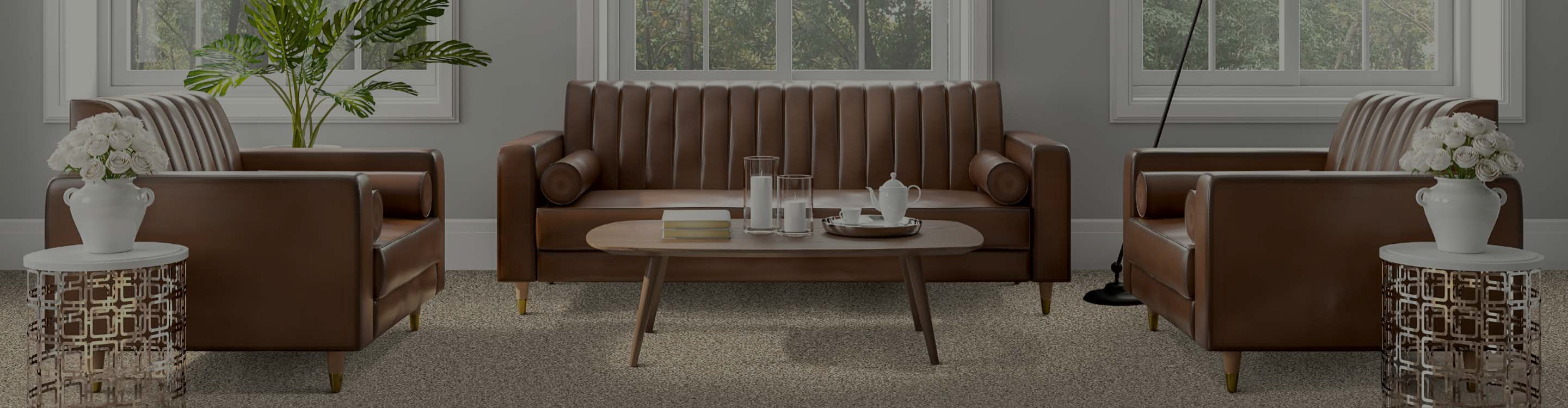 Living room in Lodi with brown couch and two chairs, beige carpet